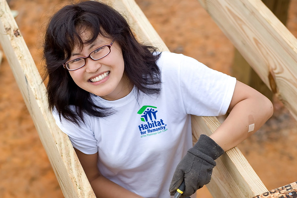 worker smiling at camera